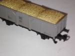 Märklin, grauer Hochboardwagen mit Ladung