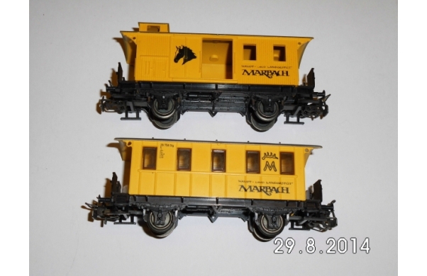 Märklin, zwei kleine gelbe Personenwagen